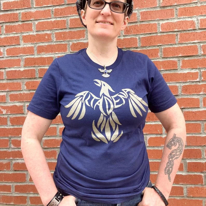 Model wearing the navy Phoenix Rising T-shirt