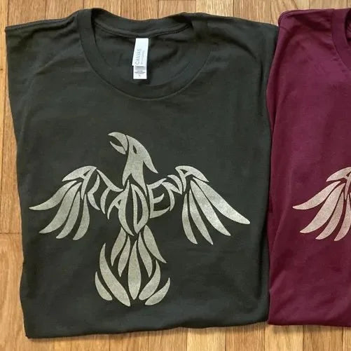 Phoenix Rising T-shirts in olive, burgundy, and navy