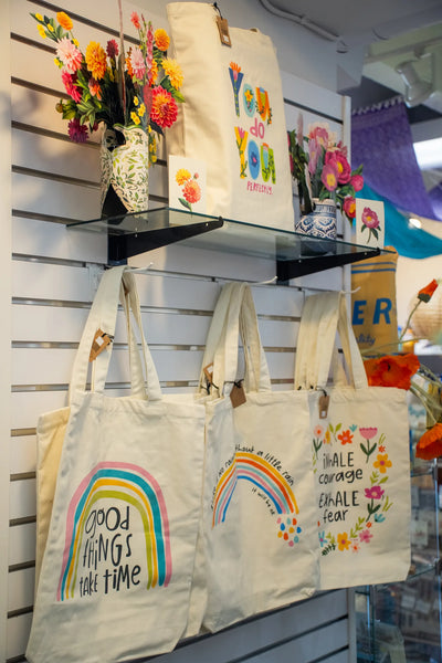Altadena tote bags on display in the shop