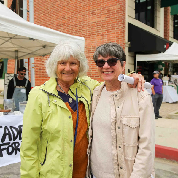 Friends at the Altadena Is Forever booth during Webster's anniversary fair