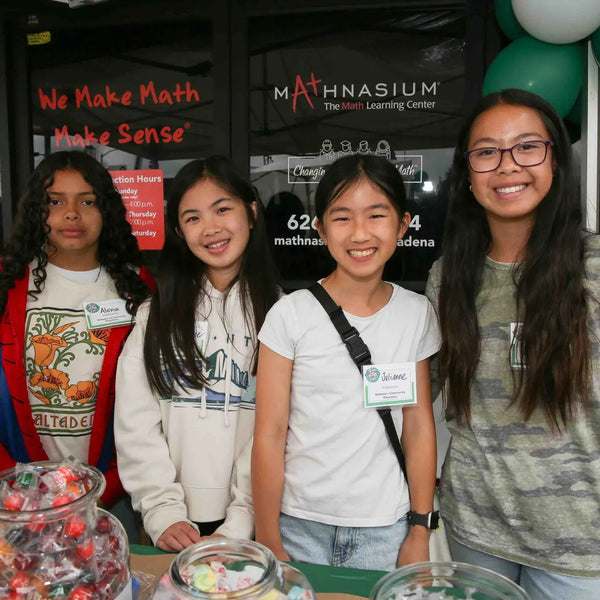 Kids at the Mathnasium candy table during Webster's 100th anniversary celebration