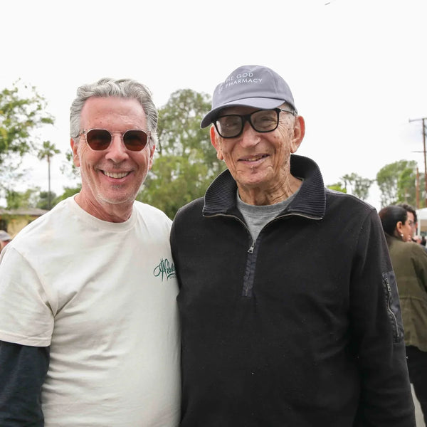 Two longtime friends posing at Webster's 100th anniversary celebration