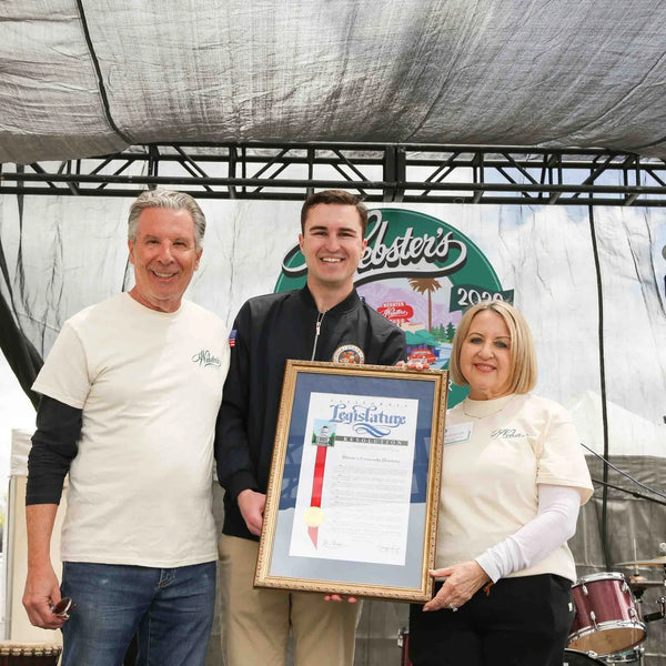 Framed proclamation presented to Webster's Pharmacy owners on the anniversary stage