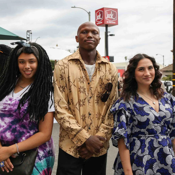 Three friends posing in the street at Webster's centennial celebration